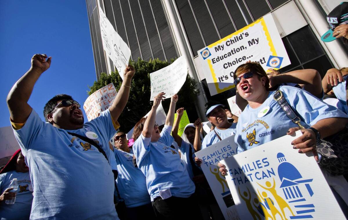 Charter school advocates hold a rally in front of LAUSD headquarters in downtown Los Angeles on Tuesday.