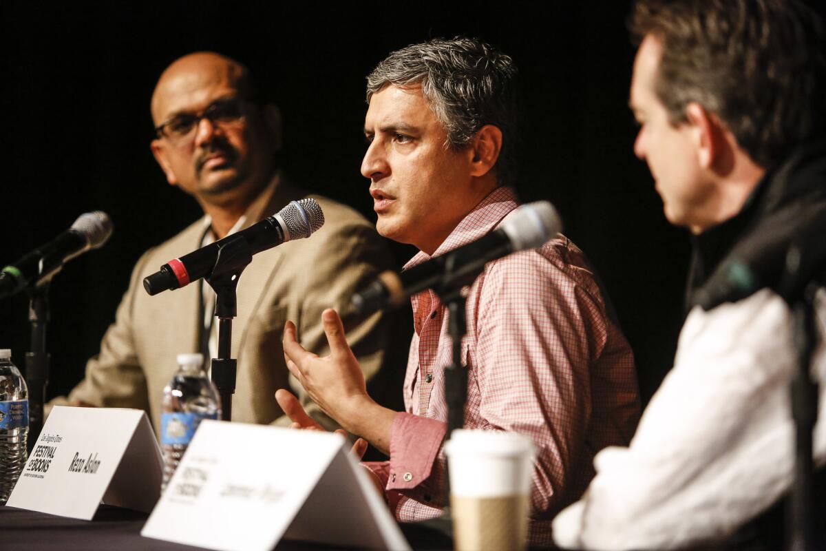 Times Editor-in-Chief Davan Maharaj, left, with authors Reza Aslan and Lawrence Wright.