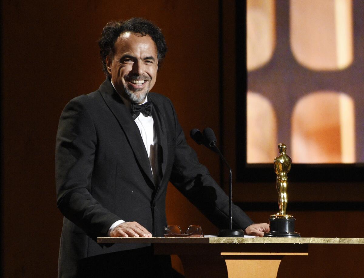 Alejandro G. Iñárritu accepts a special Oscar for "Carne y Arena" at the 9th annual Governors Awards.