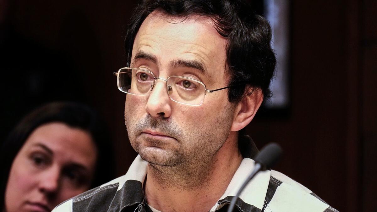 Dr. Larry Nassar listens to testimony of a witness during a preliminary hearing in Lansing, Mich., on Feb. 17.
