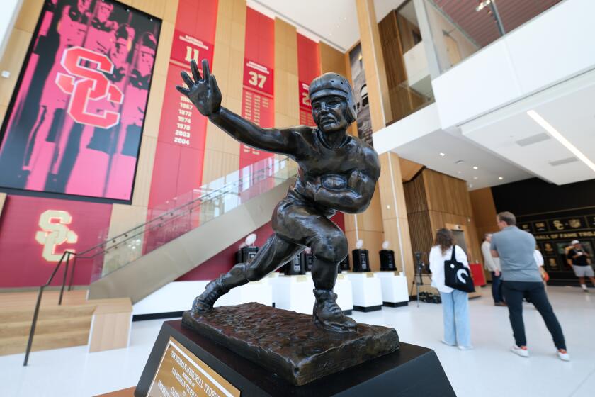 LOS ANGELES, CA - AUGUST 06, 2026: The Heisman Memorial Trophy for Caleb Williams.