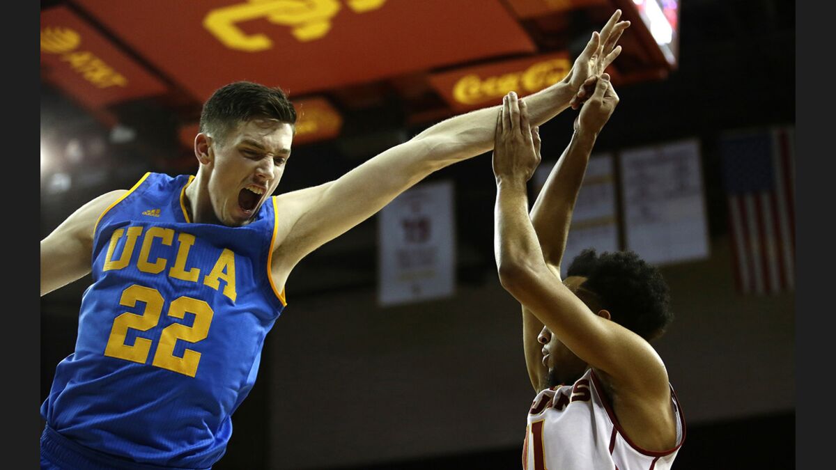 UCLA forward TJ Leaf, trying to block a shot by USC guard Jordan McLaughlin on Jan. 25, is coming off two subpar performances.