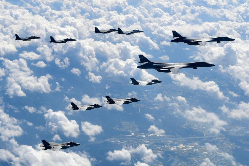 FILE - In this photo provided by South Korea Defense Ministry, U.S. Air Force B-1B bombers, F-35B stealth fighter jets and South Korean F-15K fighter jets fly over the Korean Peninsula during joint drills on Sept. 18, 2017. The United States will fly a supersonic bomber over ally South Korea as part of a massive combined aerial exercise involving hundreds of warplanes, in a show of force meant to intimidate North Korea over its barrage of ballistic missile tests this week that has escalated tensions in the region. (South Korea Defense Ministry via AP, File)