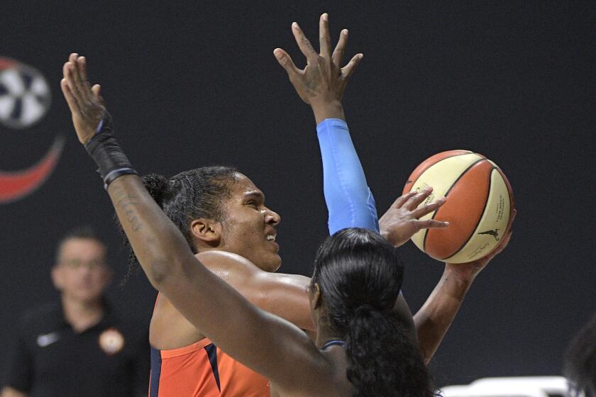 Connecticut Sun forward Alyssa Thomas goes up for a shot in front of Chicago Sky forward Cheyenne Parker, right, during the second half of a WNBA basketball first-round playoff game, Tuesday, Sept. 15, 2020, in Bradenton, Fla. (AP Photo/Phelan M. Ebenhack)