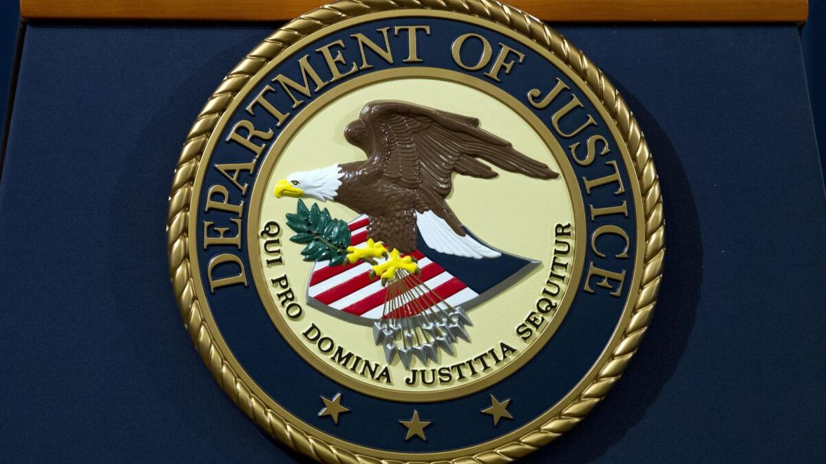 The Department of Justice seal. The Executive Office for Immigration Review, which is responsible for immigration courts, operates out of the DOJ.
