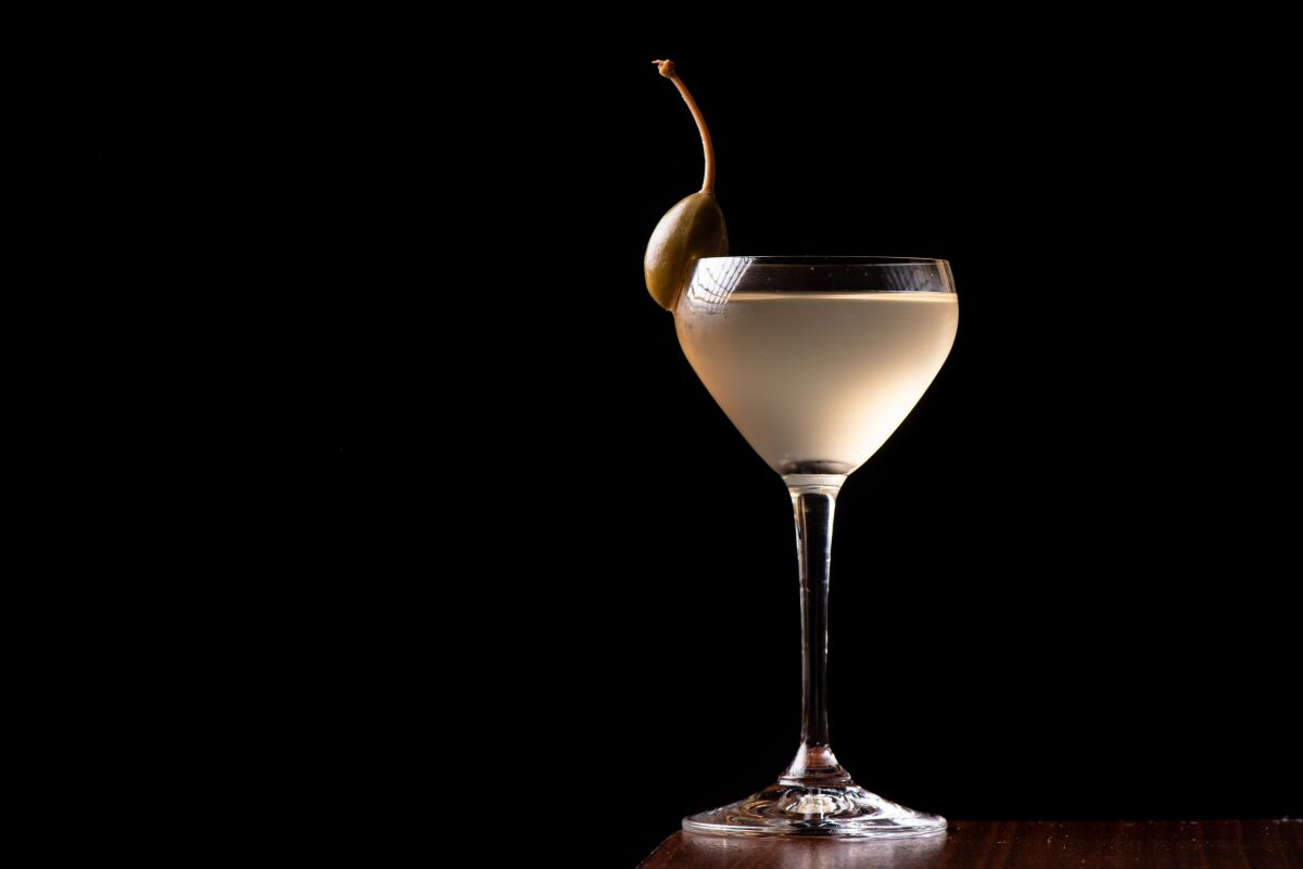 A cocktail against a black background