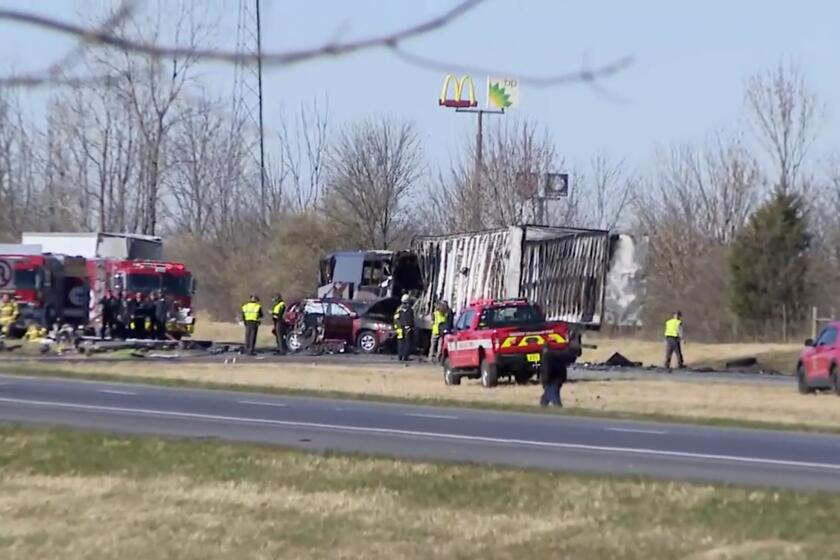Emergency responders are on the scene of a fatal accident on Interstate 70 West in Licking County, Ohio, Tuesday, Nov. 14, 2023. An emergency official says a charter bus carrying students from a high school was rear-ended by a semi-truck on the Ohio highway. (WSYX/WTTE via AP)