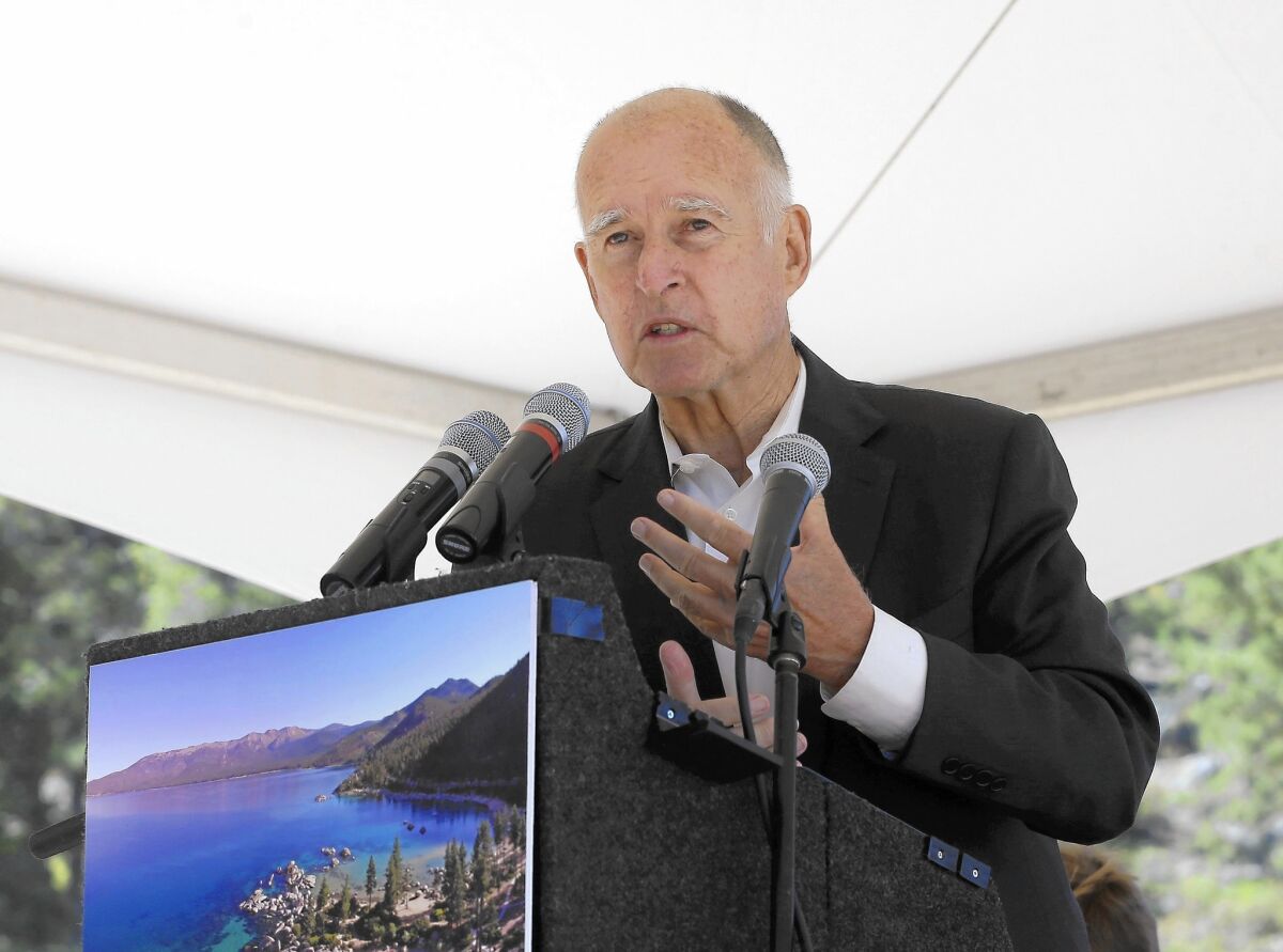 Gov. Jerry Brown, shown in Lake Tahoe, will sign the California Fair Pay Act "when it reaches his desk," a spokeswoman tweeted last week. The state Senate passsed the measure on Monday.
