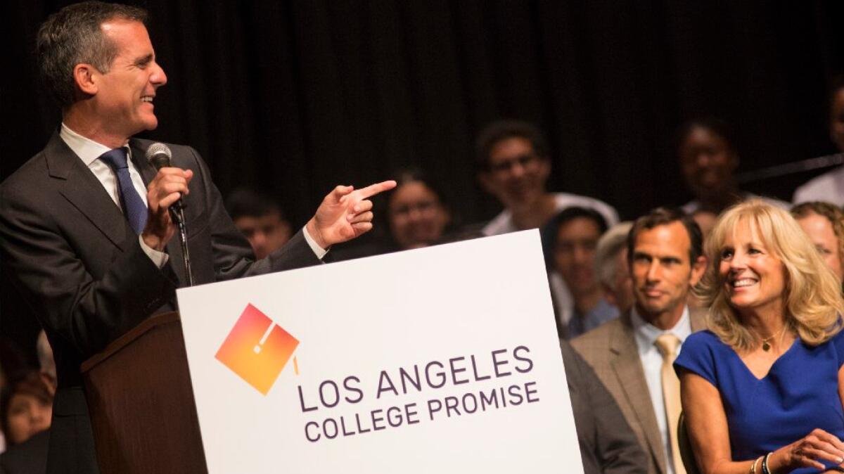 Los Angeles Mayor Eric Garcetti introduces the L.A. College Promise proposal as Jill Biden, right, looks on at Los Angeles City College.