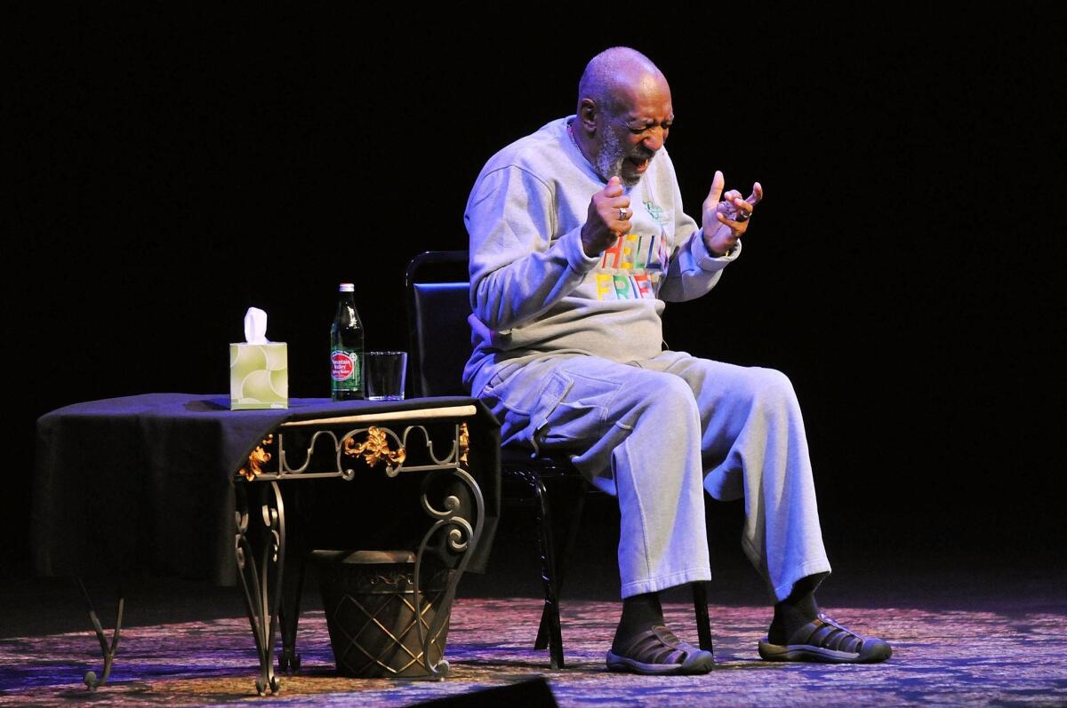 Actor Bill Cosby performs before a welcoming audience at the King Center for the Performing Arts on Friday evening in Melbourne, Fla.