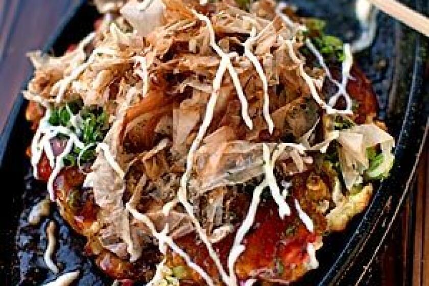 Okonomiyaki with shrimp, squid at Aburiya Toranoko.