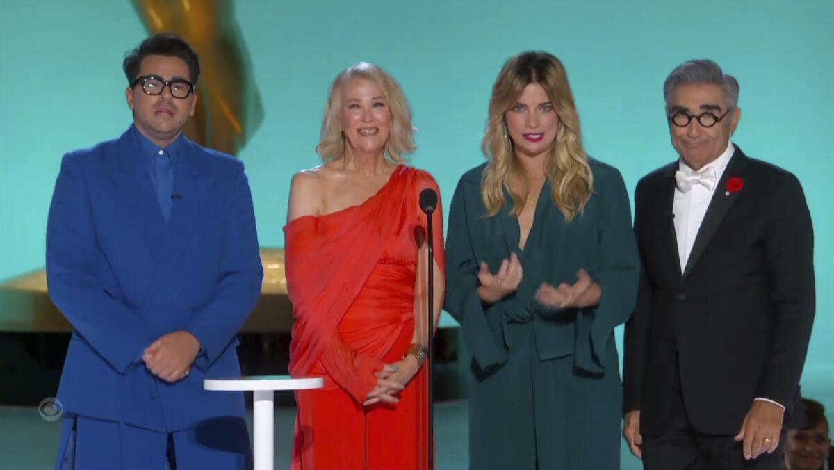 A screen grab of two women flanked by two men at Emmys