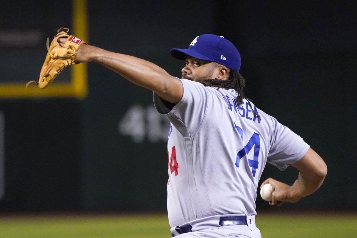 Dodgers reliever Kenley Jansen pitches in the eighth inning Aug. 31, 2019.