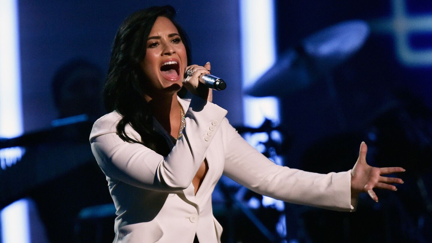 Demi Lovato sings "Hello" for a tribute to MusiCares Person of the Year honoree Lionel Richie.
