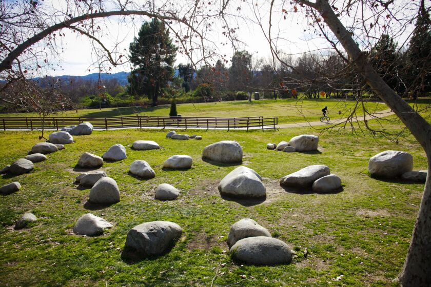 The green space below Sepulveda Dam includes sylvan landscaping that echoes Mother Nature's work. The walk begins at a parking area near a cricket lawn and heads south along Haskell Creek.