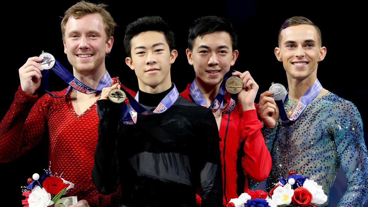 U.S. figure skating championship medalists (from left) Ross Miner, Nathan Chen, Vincent Zhou and Adam Rippon pose on the podium Saturday night in San Jose.