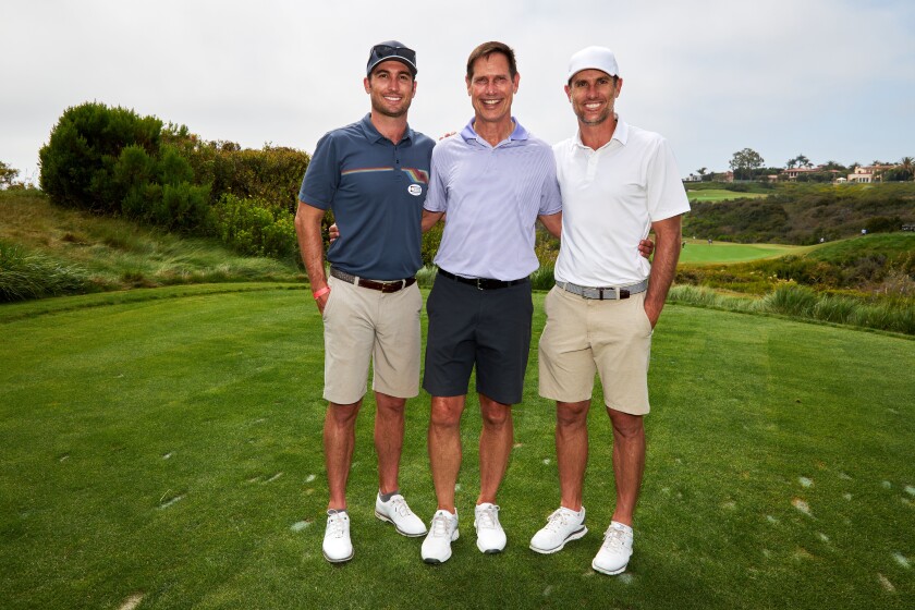 Ο Paul McDonald, σέντερ, με τους γιους του Andrew McDonald και Michael McDonald παρευρίσκονται στο Rivals Cup Golf Tournament.
