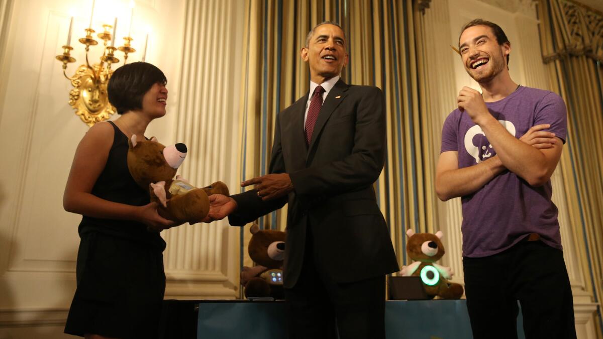 President Obama meets with Hannah Chung and Aaron Horowitz as he hosts innovators and startup founders from across the country. Chung holds a stuffed bear with educational apps.