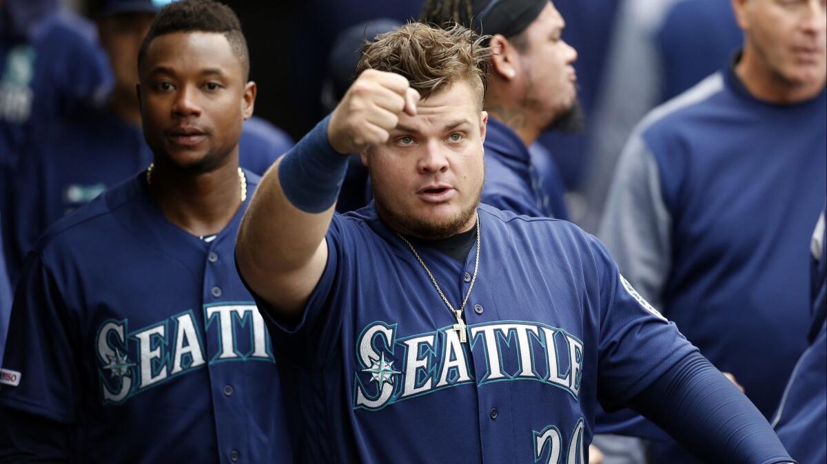 Seattle Mariners first baseman Daniel Vogelbach celebrates after hitting a three-run double against the Chicago White Sox on April 7.
