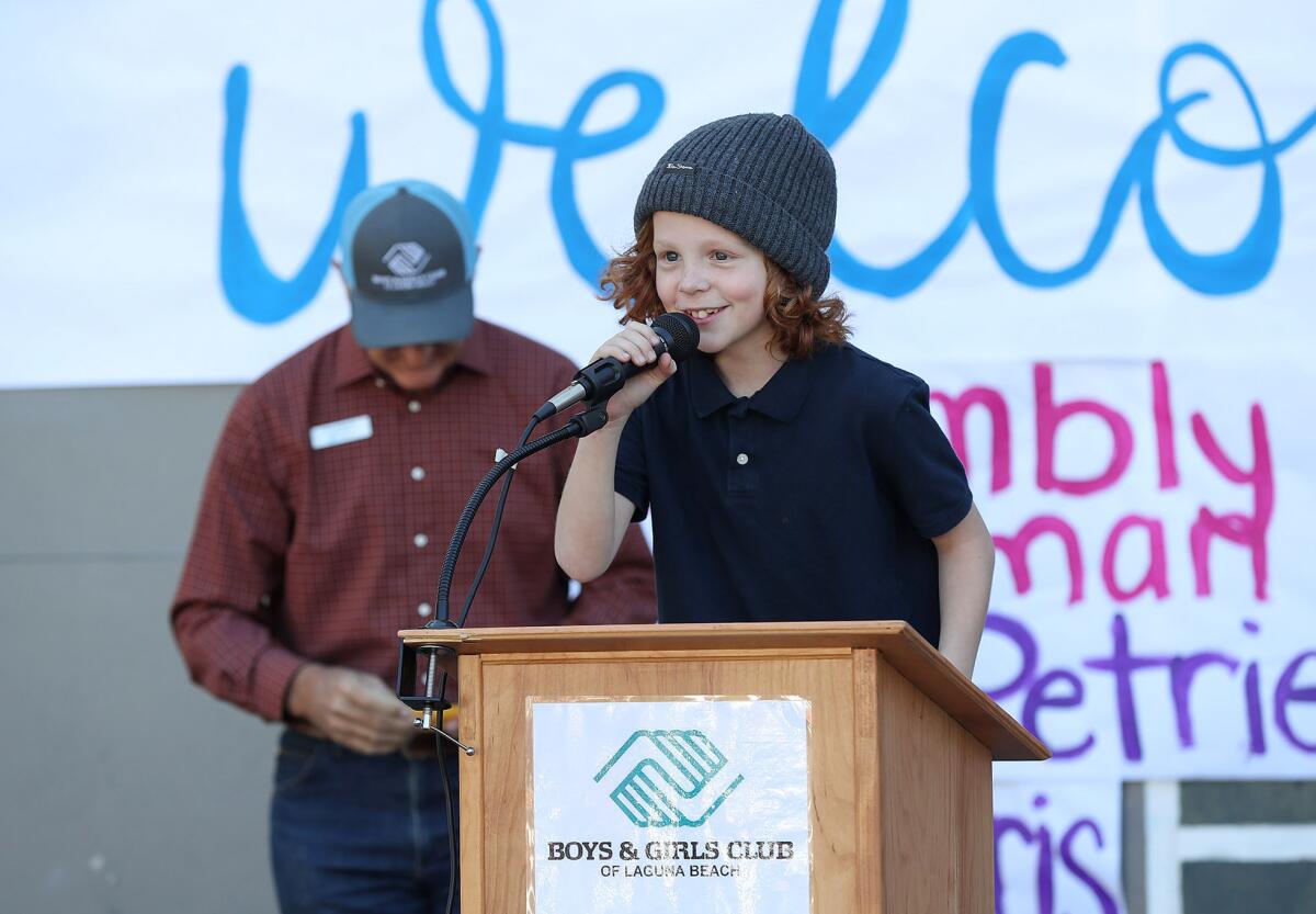 Club member Owen makes thank you comments during a check presentation ceremony at the Boys & Girls Club on Wednesday.