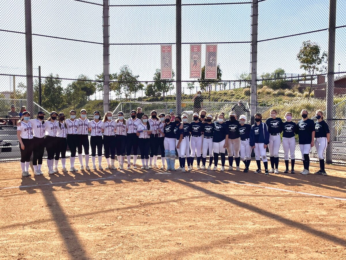 The CCA and SDA softball teams at the Battle of the Academies.