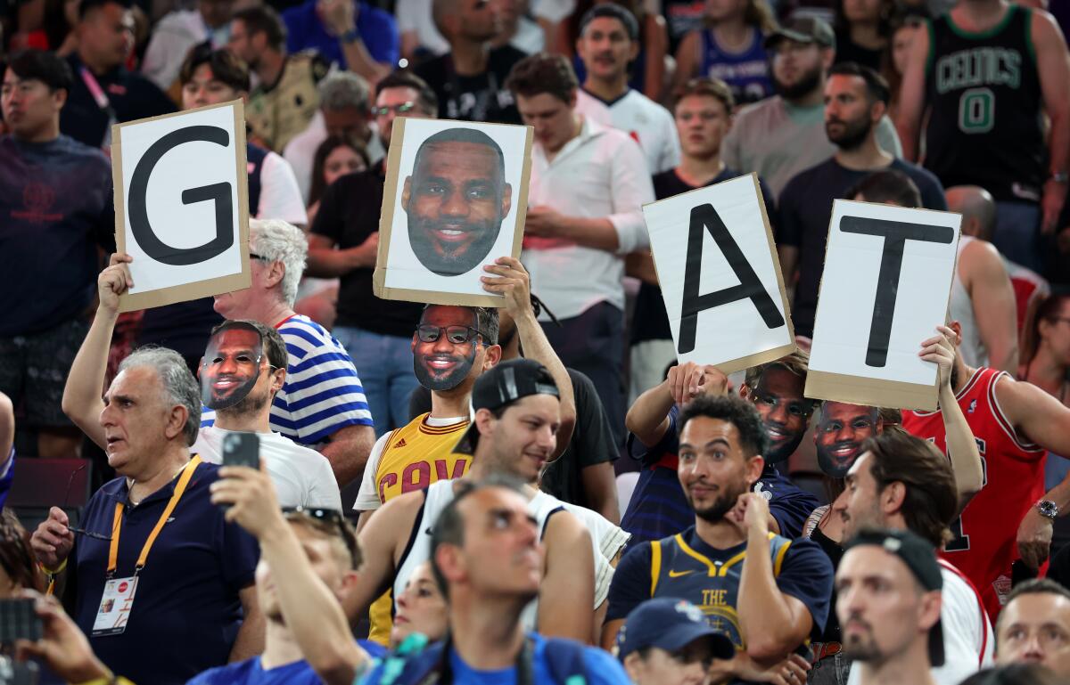 Fans cheer for American LeBron James during a win over Brazil in the quarterfinals at the 2024 Paris Olympics 