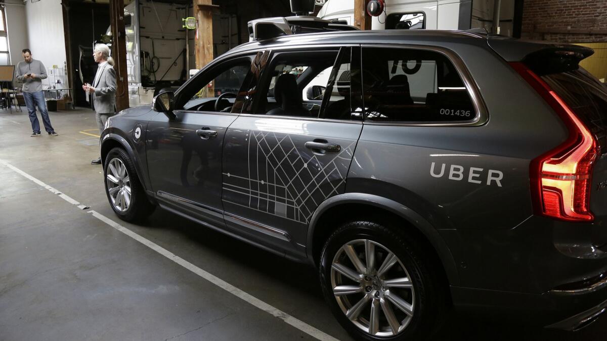 An Uber driverless car is displayed in a garage in San Francisco on Dec. 13, 2016.