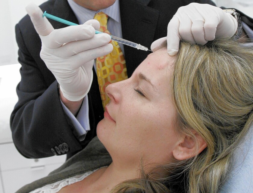 Allergan is a specialty pharmaceutical company, which makes most of its money from the popular wrinkle treatment Botox but also sells breast implants and a line of ophthalmic drugs, including Restasis, the only prescription drug to treat chronic dry eye. Above, Amy Andrade of Dallas receives Botox treatment in 2006.