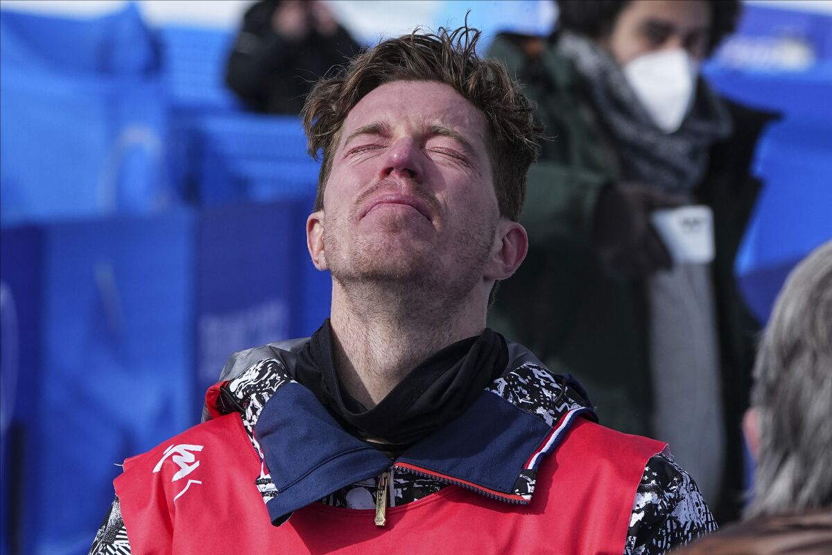 United States' Shaun White get emotional after competing in the men's halfpipe finals at the 2022 Winter Olympics, Friday, Feb. 11, 2022, in Zhangjiakou, China. (AP Photo/Gregory Bull)