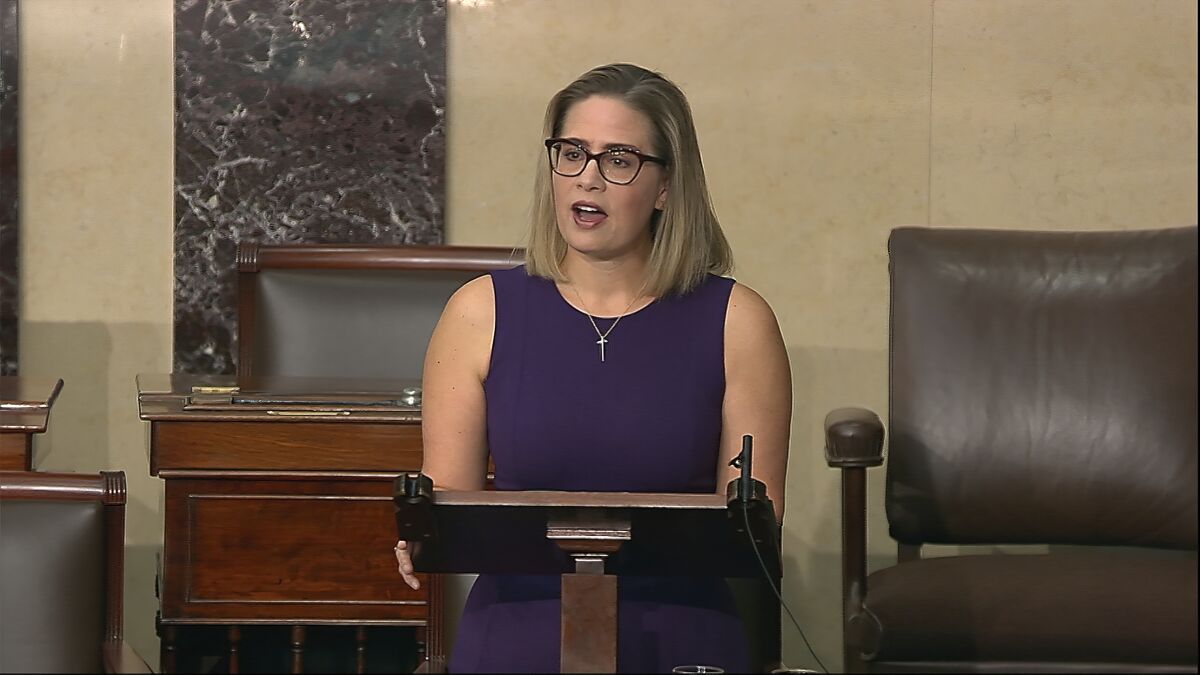 Sen. Kyrsten Sinema (D-Ariz.) speaks on the floor of the U.S. Senate Thursday.