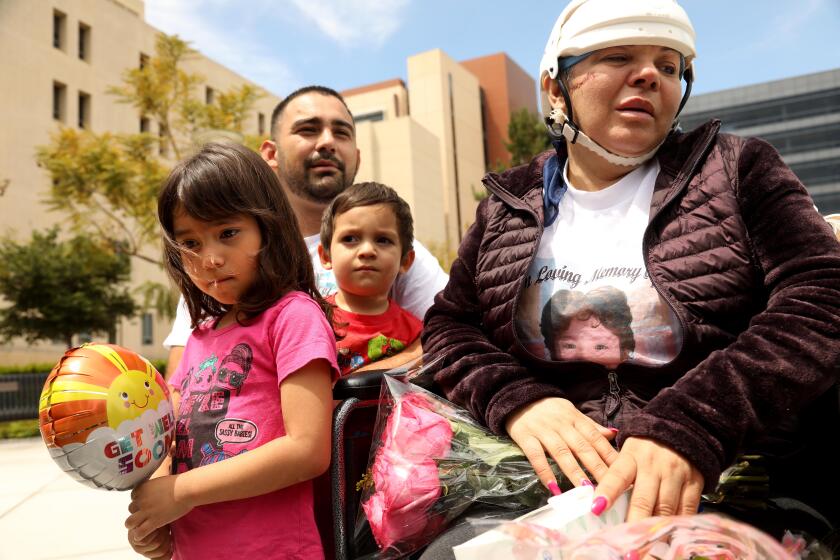 Blanca Ismeralda Tamayo, right, next to her son Louis Tovar, 25, and her grandchildren Layla, 4, and Theo, 2, on May 5, 2021.