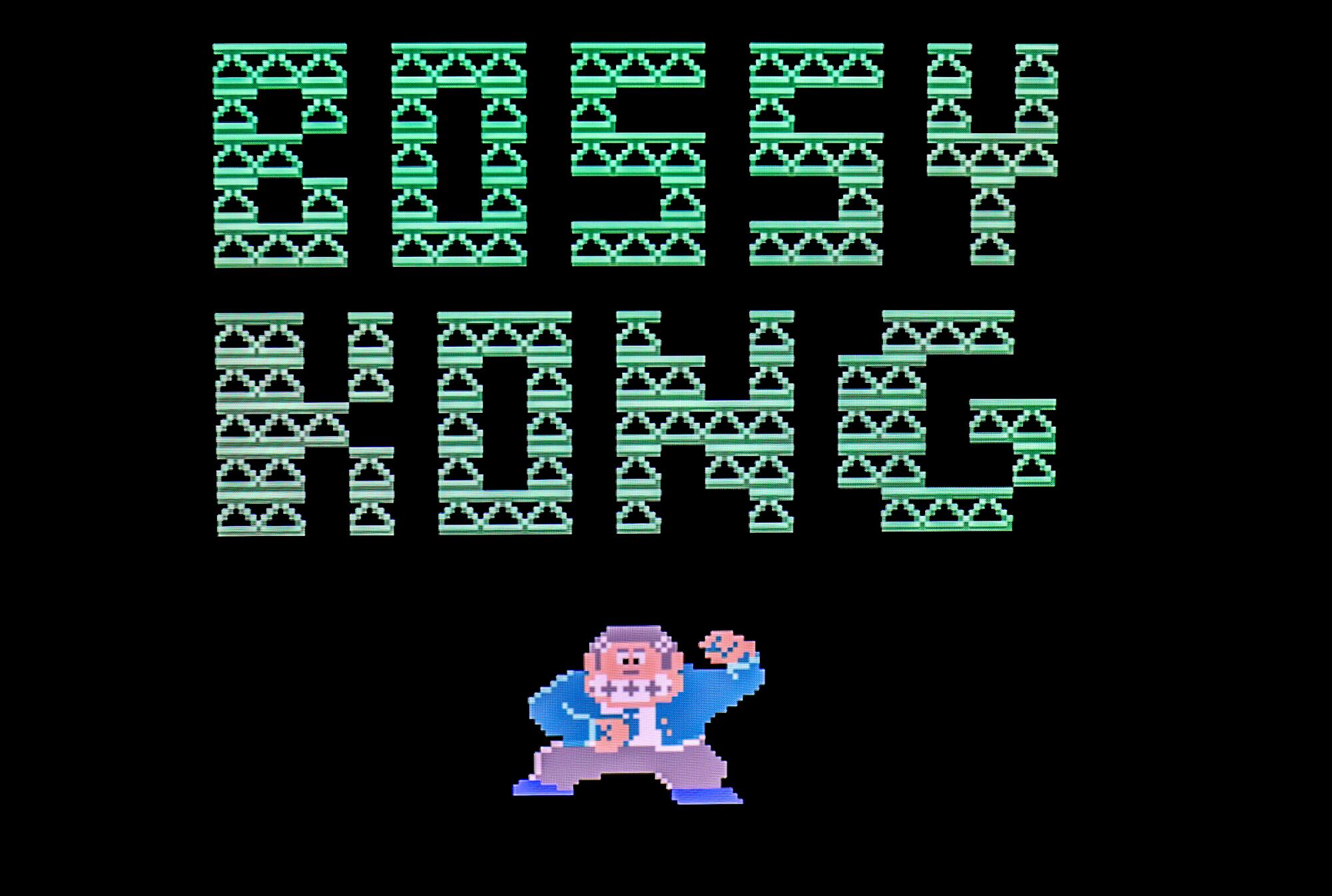 The title screen for "Bossy Kong," presented in capital letters and a small illustration of a monkey in a suit.