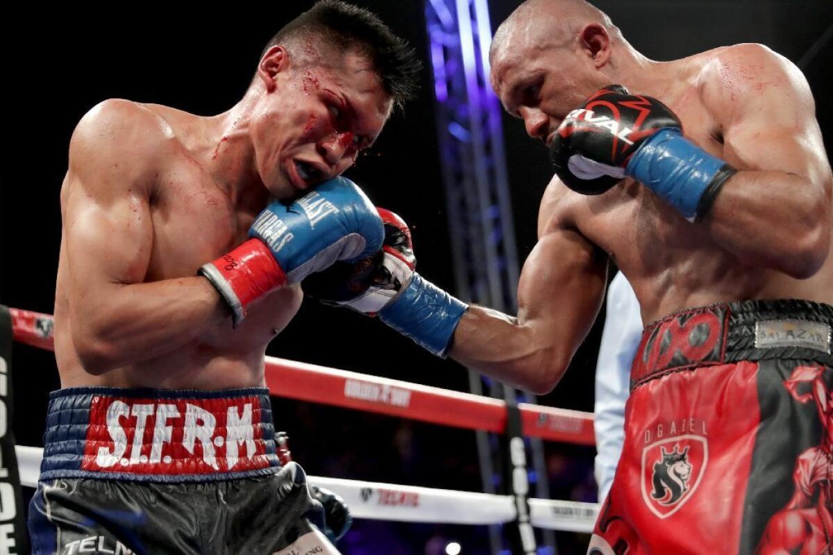 Orlando Salido throws a right at Francisco Vargas, left, during their WBC super-featherweight championship bout at StubHub Center on June 4.