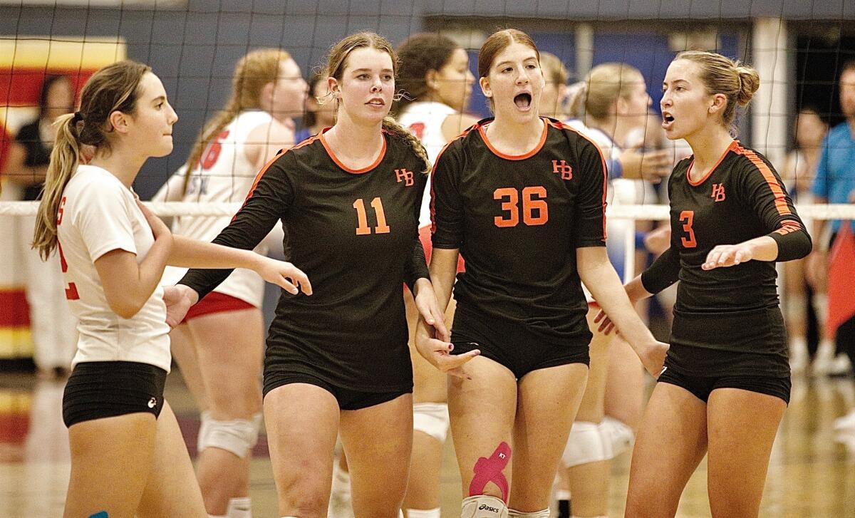 Huntington Beach's Olivia Foye, Haylee LaFontaine, Kylie Leopard and Dani Sparks, from left, against Los Alamitos on Oct. 3.