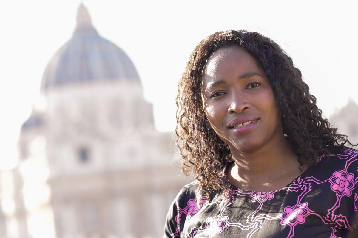 Southern African Catholic Bishops' Conference Communication Officer Sheila Pires poses for a portrait at The Vatican, Friday, Sept. 29, 2023. Pires has been invited to take part in the next synod of bishops starting Oct. 4. I think the church has just come to a point of realization that the church belongs to all of us, to all the baptized, she says. Of the 365 voting members, only 54 are women and organizers insist the aim is to reach a consensus, not tally votes like a parliament. But the voting reform is nevertheless significant, tangible evidence of Francis vision of the Catholic Church as being more about its flock than its shepherds. (AP Photo/Domenico Stinellis)