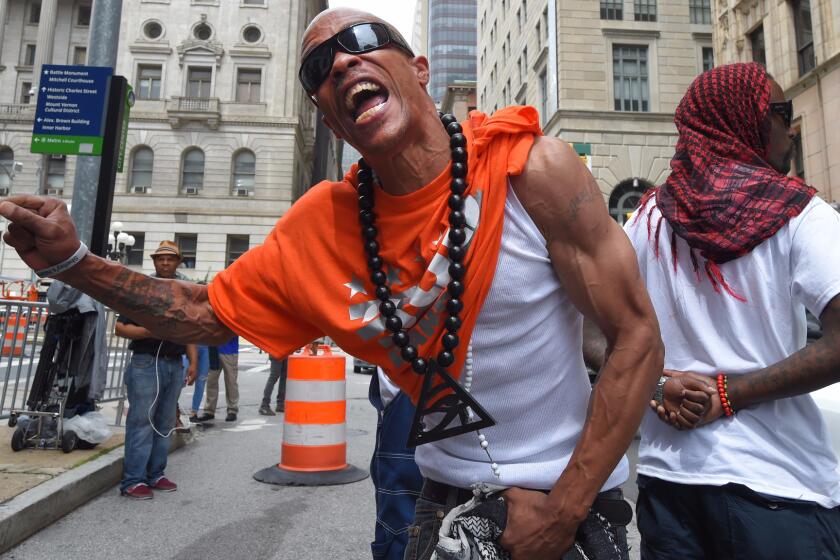 Duane G. Davis reacts outside the Baltimore courthouse after hearing that Officer Caesar Goodson Jr. had been found not guilty in the death of Freddie Gray.