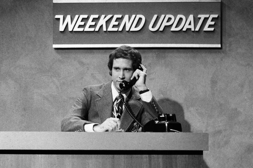 Chevy Chase performs during a "Weekend Update" sketch on "Saturday Night Live" in New York on Oct. 11, 1975, during the show's premiere.
