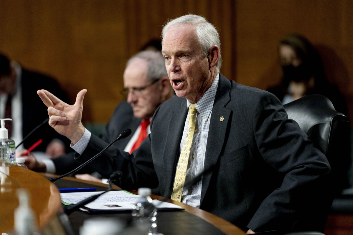FILE - Sen. Ron Johnson, R-Wis., speaks on Capitol Hill in Washington, on Feb. 8, 2022. Democrats are fighting for a way to break out to be the one to take on Johnson in a race expected to be one of the most expensive and tightest in the country. (AP Photo/Andrew Harnik, File)