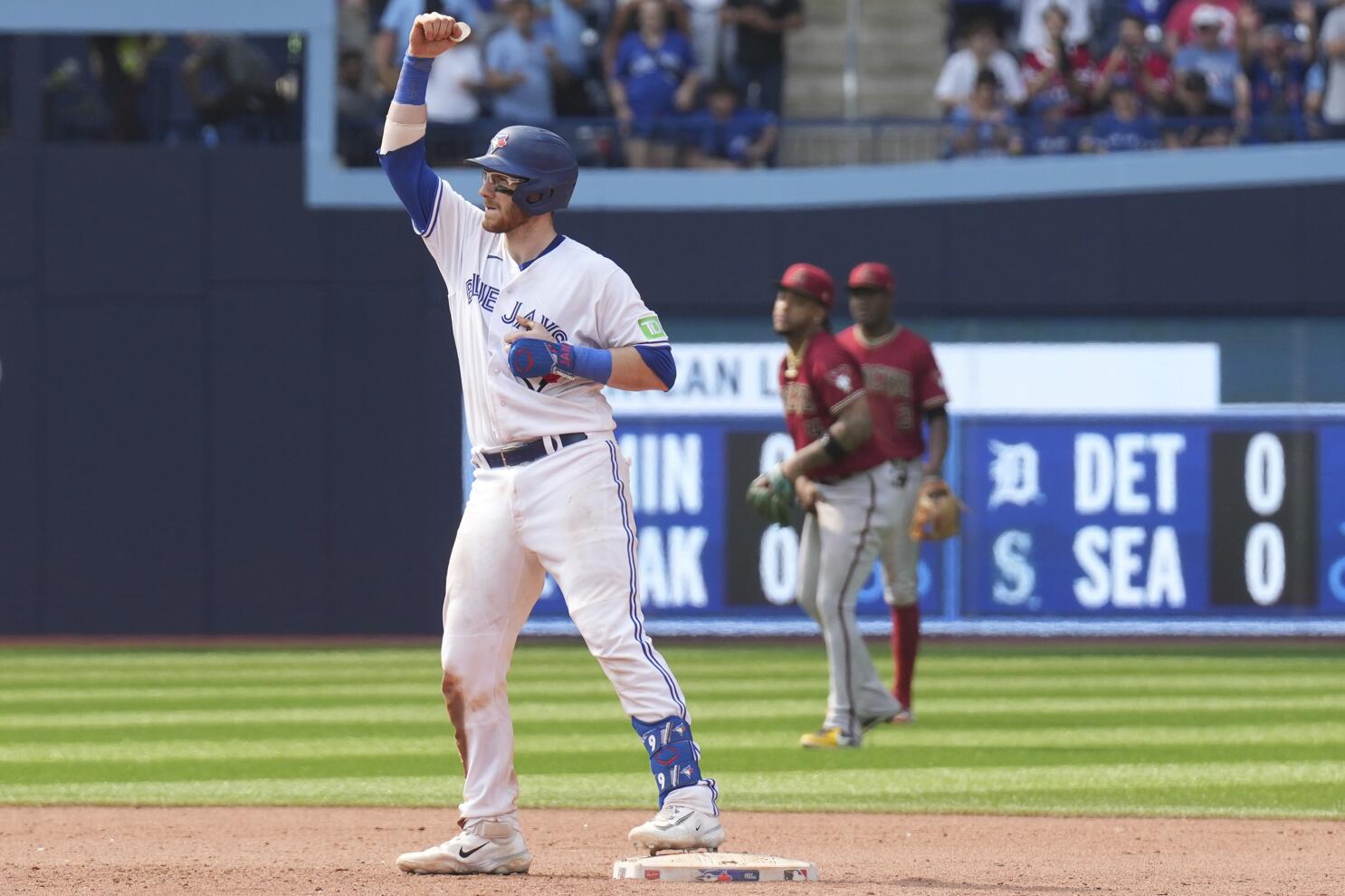 Toronto Blue Jays' Danny Jansen stands on the base path against