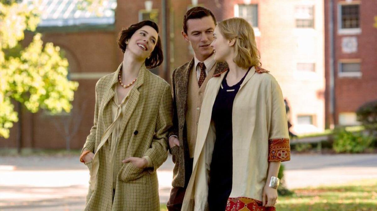 Rebecca Hall, left, stars as Elizabeth Marston, Luke Evans as Dr. William Marston and Bella Heathcote as Olive Byrne in "Professor Marston and the Wonder Women."