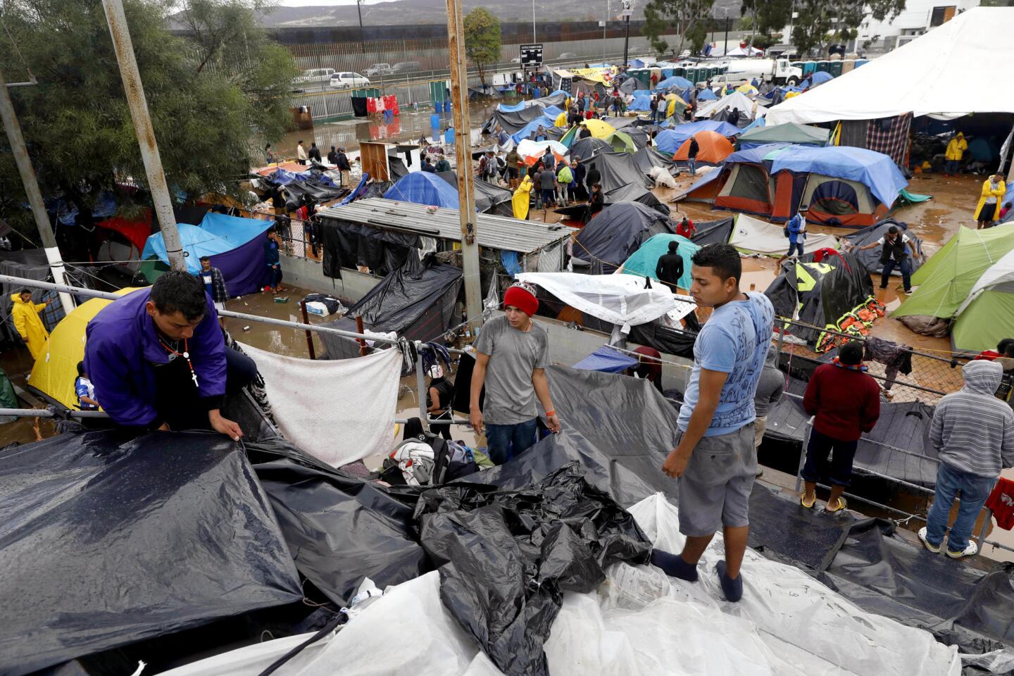 Rain drenches Tijuana migrant camp