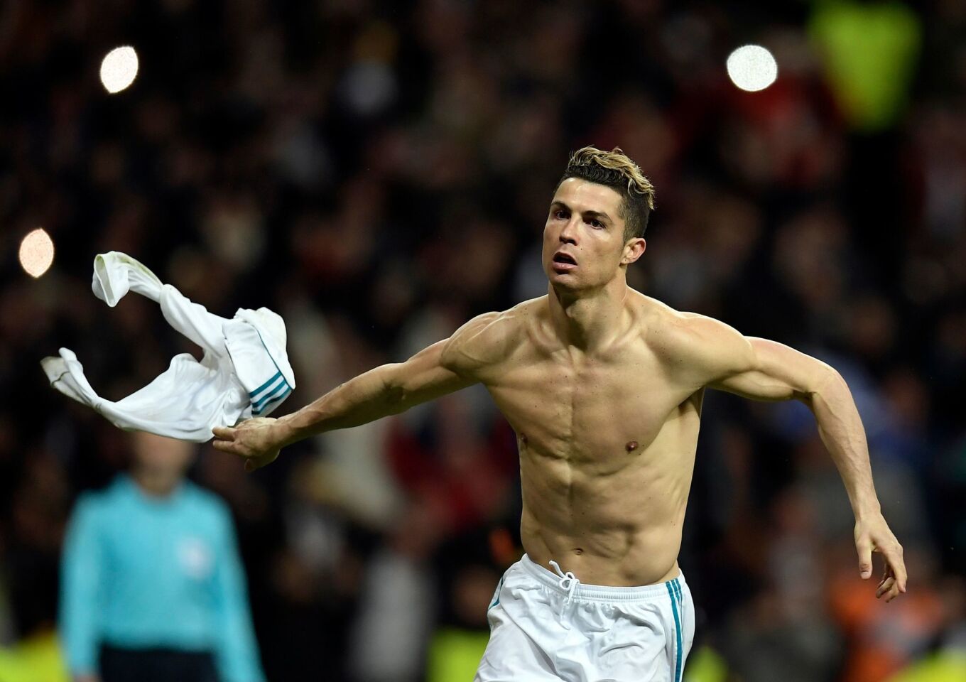 Real Madrid's Portuguese forward Cristiano Ronaldo celebrates after scoring during the UEFA Champions League quarter-final second leg football match between Real Madrid CF and Juventus FC at the Santiago Bernabeu stadium in Madrid on April 11, 2018. / AFP PHOTO / OSCAR DEL POZOOSCAR DEL POZO/AFP/Getty Images ** OUTS - ELSENT, FPG, CM - OUTS * NM, PH, VA if sourced by CT, LA or MoD **