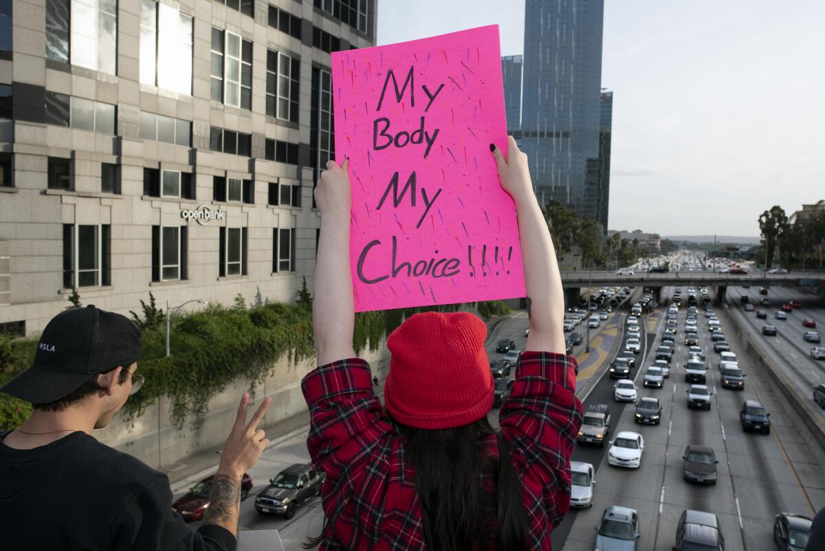 Activists protest restrictions on abortions on May 21, 2019, in Los Angeles. 