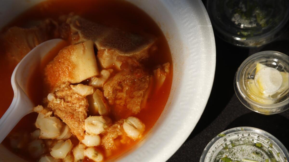 A fresh bowl of menudo is ready to be eaten at the Mr. Menudo pop-up stand in Compton.