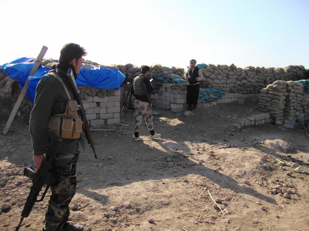 Kurdish peshmerga fighters on Mt. Bashiqa have been keeping an eye of Mosul below. There are signs Isalmic State's grip on the city is slipping, the Kurds said. Recent militant convoys from Mosul have been smaller and less frequent.