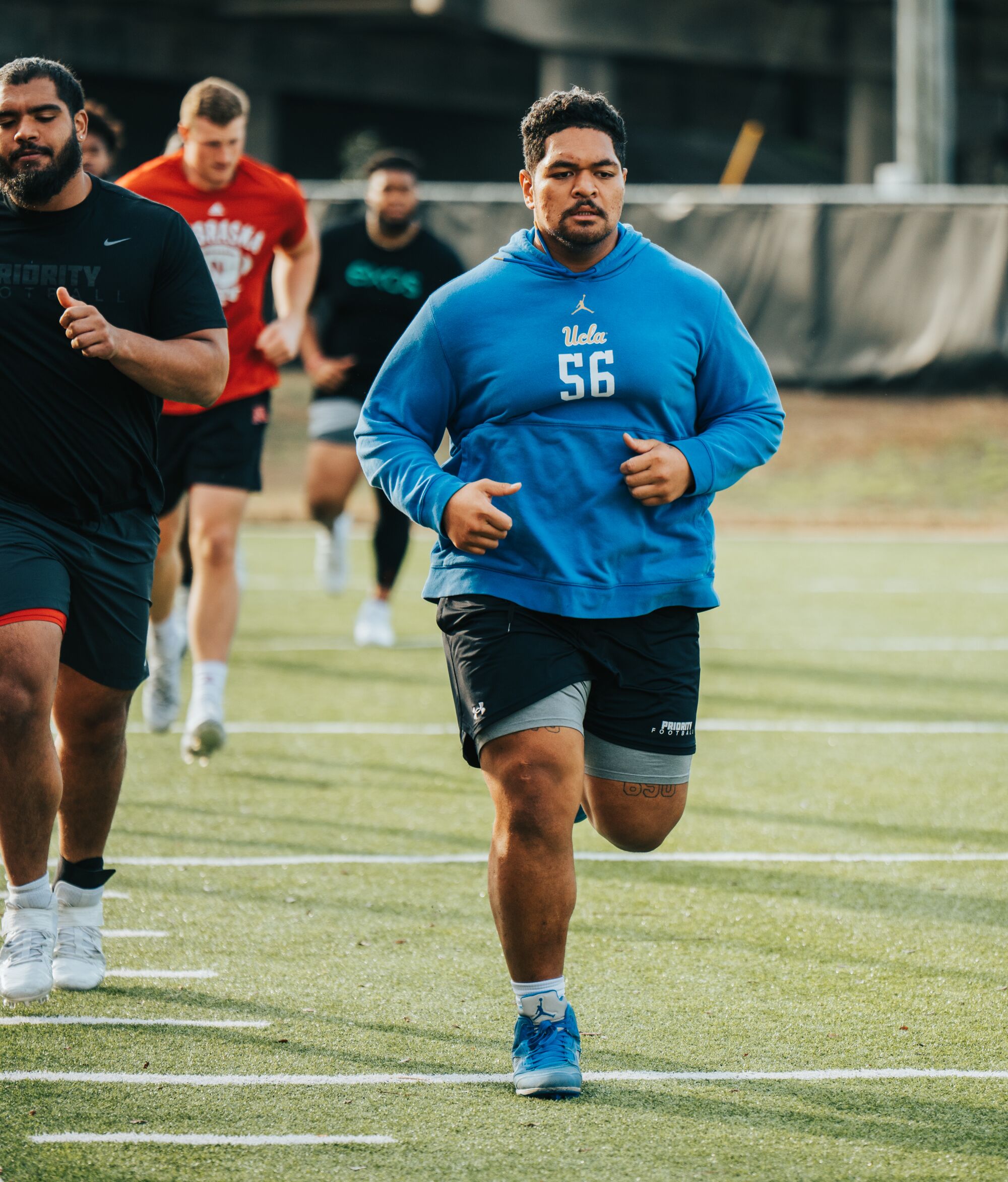 Former UCLA lineman Atonio Mafi runs during a pre-NFL draft workout in Florida.