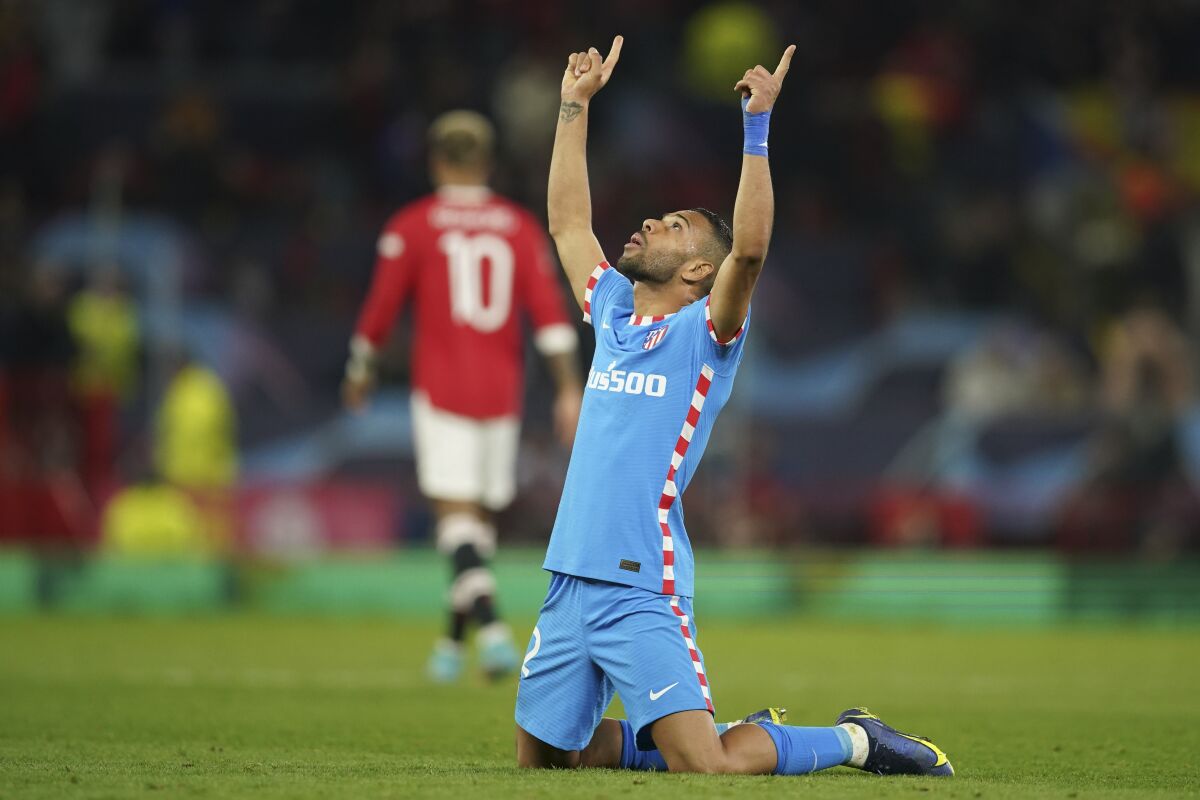 Atletico Madrid's Renan Lodi reacts following the Champions League round of 16, second leg soccer match between Manchester United and Atletico Madrid at Old Trafford, Manchester, England, Tuesday, March 15, 2022. (AP Photo/Dave Thompson)