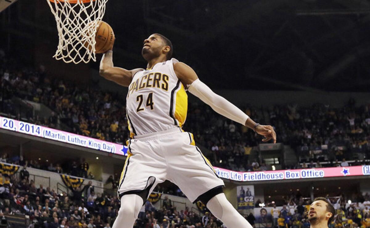 Indiana Pacers small forward Paul George dunks during a win over the Clippers on Thursday.