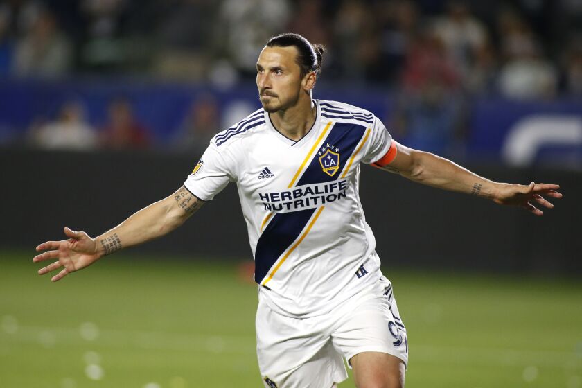 CARSON, CALIFORNIA - MARCH 31: Zlatan Ibrahimovic #9 of Los Angeles Galaxy celebrates his second goal against the Portland Timbers during the second half at Dignity Health Sports Park on March 31, 2019 in Carson, California. (Photo by Katharine Lotze/Getty Images)