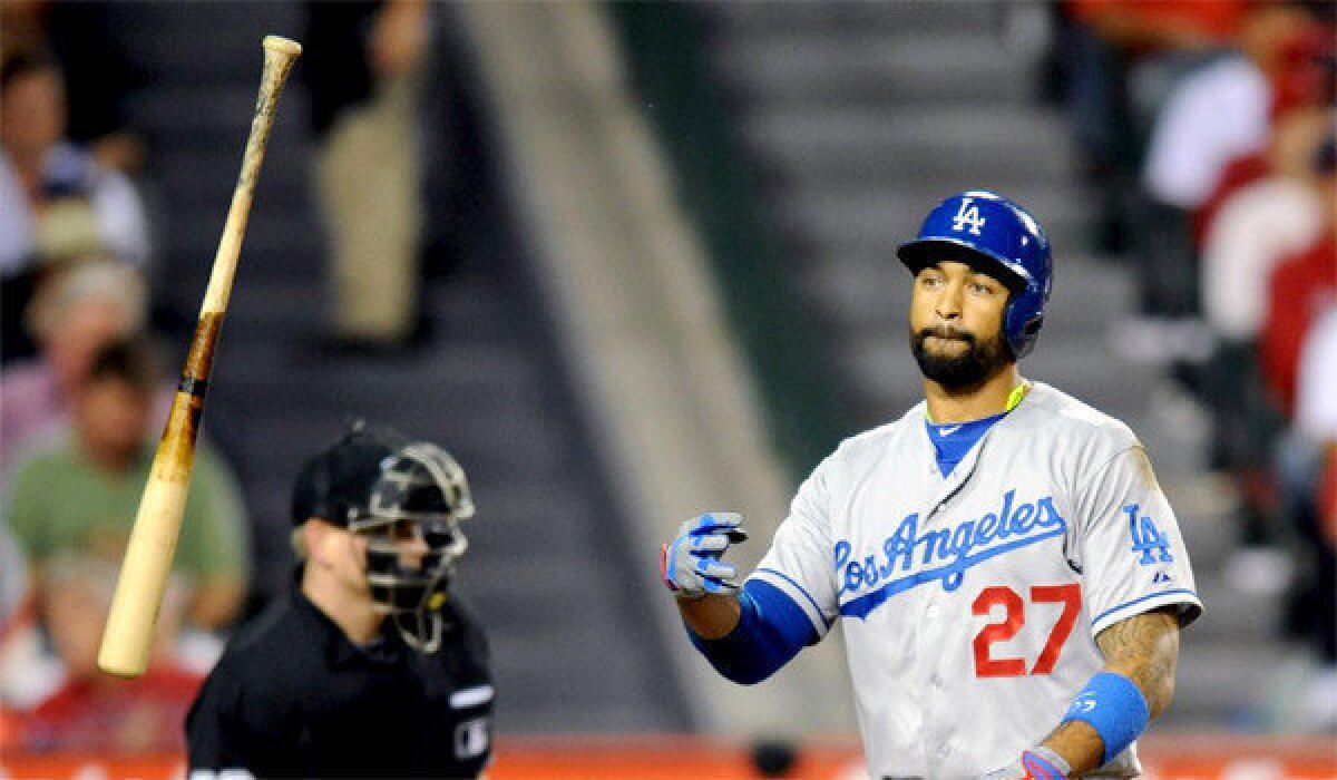 Matt Kemp suffered an injury to his right hamstring during the Dodgers' loss to the Angels, 4-3.
